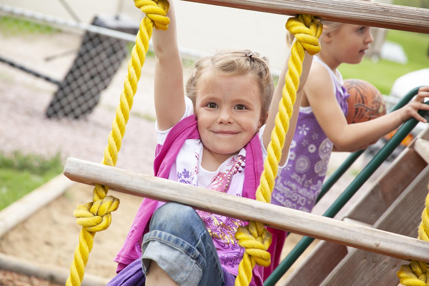 child on swing